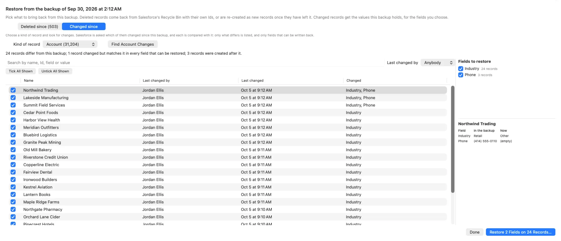 Restoring from an earlier backup in Org Launcher: a list of Accounts whose Industry one user changed, each with a tick box. Northwind Trading shows Retail in the backup and Other now, beside a button to restore the chosen fields on those records.